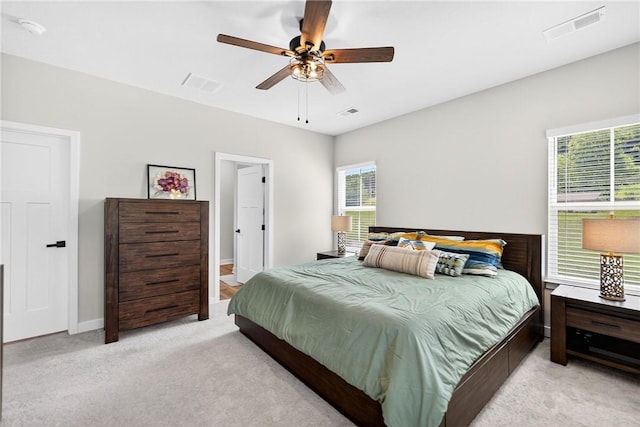 124 Rivulet Pl, Jackson Twp, PA 16063 - bedroom featuring light colored carpet, multiple windows, and a ceiling fan