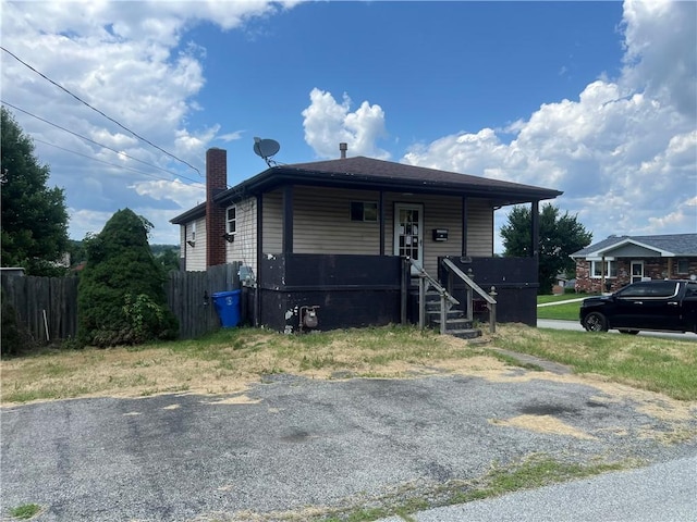 212 Shaffer Ave, Elizabeth Twp/Boro, PA 15037 - bungalow-style house with a chimney and a porch