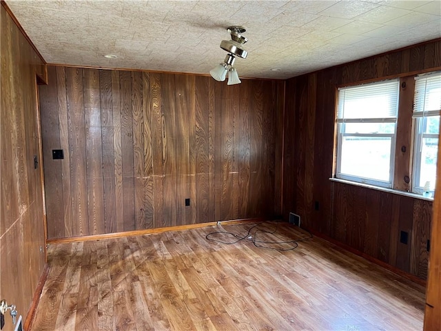 212 Shaffer Ave, Elizabeth Twp/Boro, PA 15037 - unfurnished room featuring wood walls and wood finished floors
