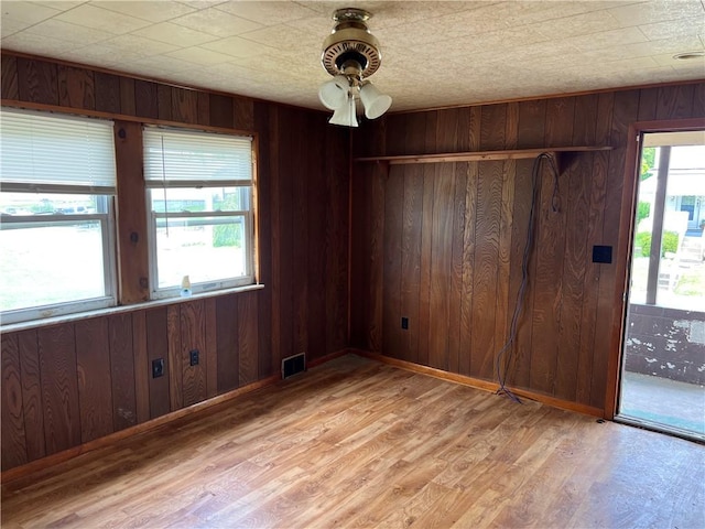 212 Shaffer Ave, Elizabeth Twp/Boro, PA 15037 - unfurnished dining area featuring wood walls and light wood finished floors