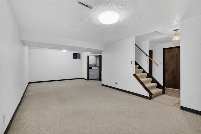 102 Barnwood Ln, Ross Twp, PA 15237 - finished basement featuring stairs, a textured ceiling, and carpet flooring