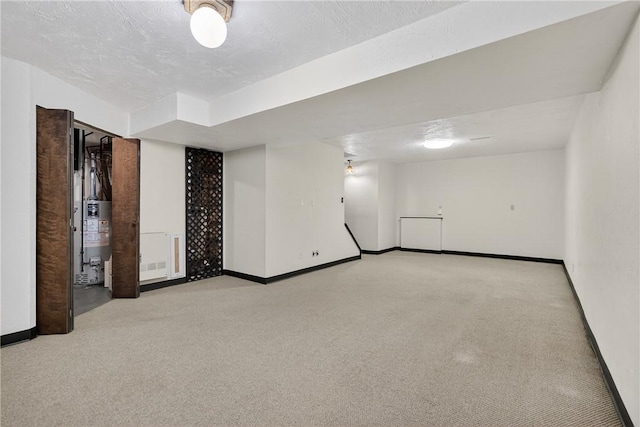 102 Barnwood Ln, Ross Twp, PA 15237 - empty room with carpet flooring and gas water heater