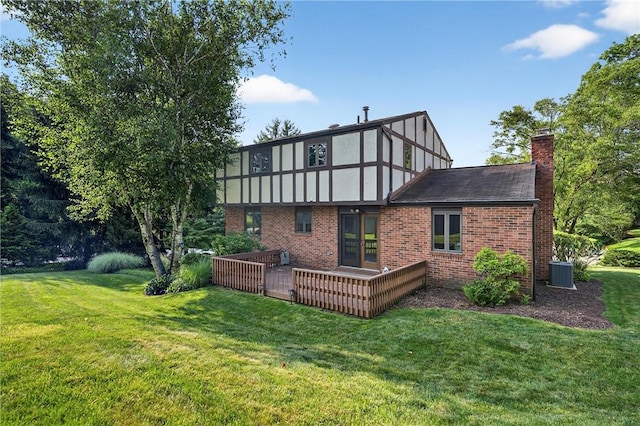 102 Barnwood Ln, Ross Twp, PA 15237 - rear view of house with brick siding, a yard, and a chimney