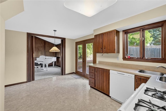 102 Barnwood Ln, Ross Twp, PA 15237 - kitchen with white appliances, healthy amount of natural light, light countertops, and french doors
