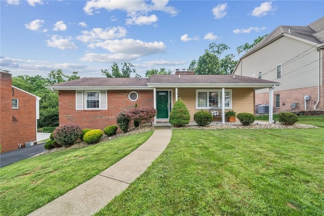 12 Lynmar Dr, Shaler, PA 15209 - view of front of property with a front lawn, brick siding, and covered porch