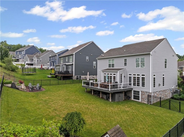 109 Overbrook Dr, Cranberry Twp, PA 16066 - back of property with a deck, a residential view, a fenced backyard, an outdoor fire pit, and stone siding