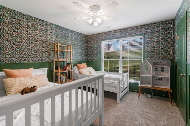 109 Overbrook Dr, Cranberry Twp, PA 16066 - bedroom featuring wallpapered walls, wainscoting, carpet flooring, and ceiling fan