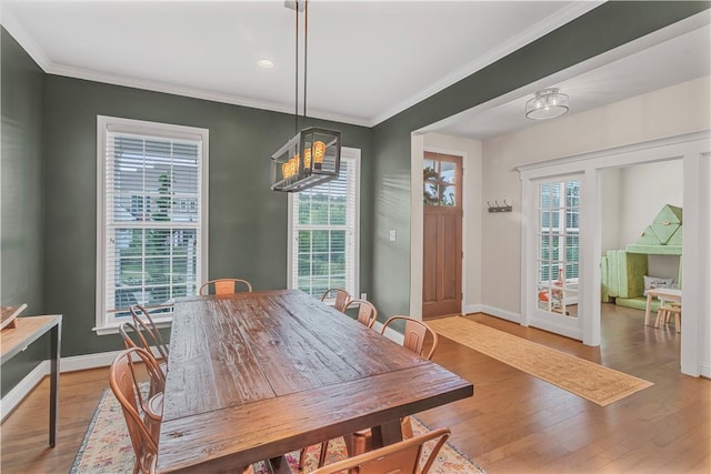 109 Overbrook Dr, Cranberry Twp, PA 16066 - dining space with wood finished floors, ornamental molding, and a chandelier