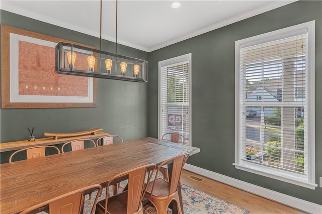 109 Overbrook Dr, Cranberry Twp, PA 16066 - dining area featuring wood finished floors and ornamental molding