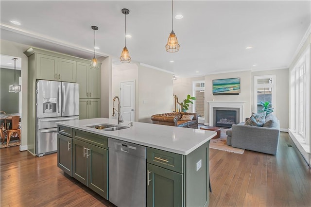 109 Overbrook Dr, Cranberry Twp, PA 16066 - kitchen featuring appliances with stainless steel finishes, green cabinetry, dark wood-type flooring, light countertops, and ornamental molding