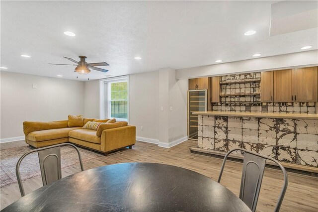 109 Overbrook Dr, Cranberry Twp, PA 16066 - dining room featuring beverage cooler, recessed lighting, light wood-type flooring, and a ceiling fan