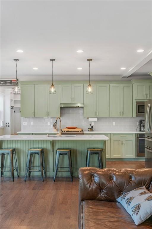 109 Overbrook Dr, Cranberry Twp, PA 16066 - kitchen featuring green cabinetry, decorative backsplash, pendant lighting, and recessed lighting