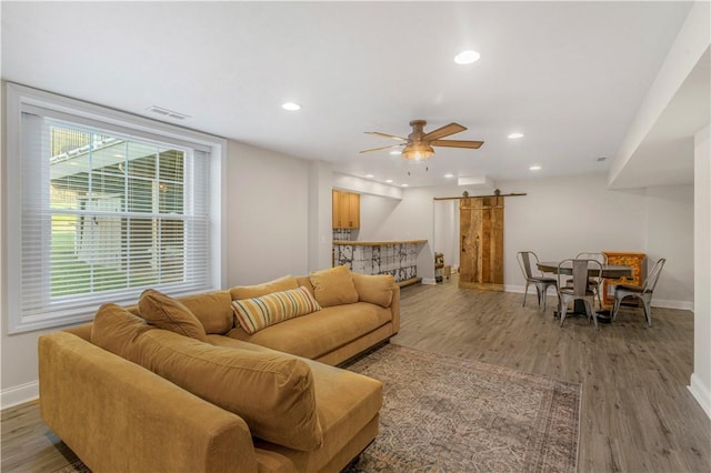 109 Overbrook Dr, Cranberry Twp, PA 16066 - living room with a barn door, ceiling fan, light wood finished floors, and recessed lighting