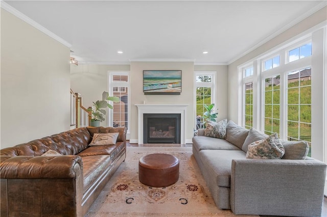 109 Overbrook Dr, Cranberry Twp, PA 16066 - living room featuring ornamental molding, a glass covered fireplace, and recessed lighting