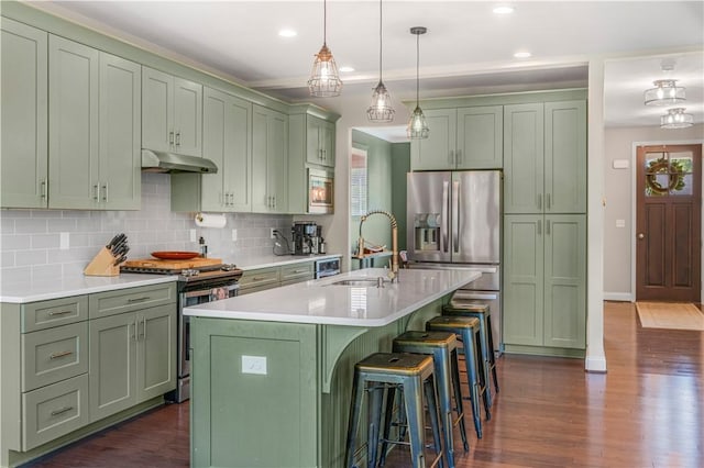 109 Overbrook Dr, Cranberry Twp, PA 16066 - kitchen featuring appliances with stainless steel finishes, green cabinetry, under cabinet range hood, and recessed lighting