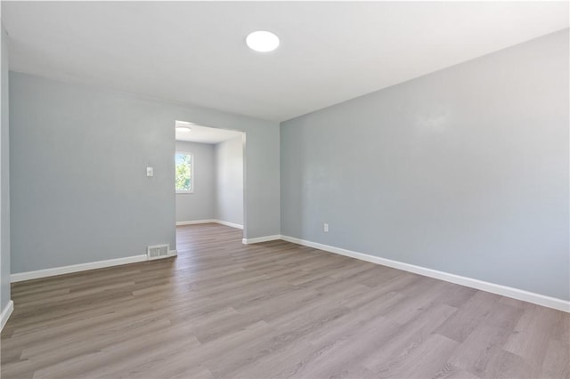 1625 Loretta Dr, Penn Hills, PA 15235 - empty room with light wood-style flooring and baseboards
