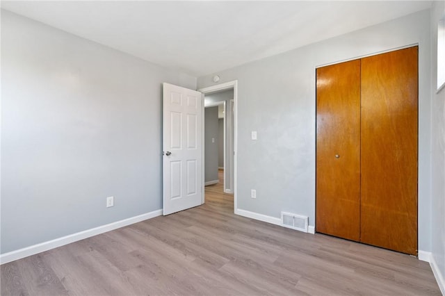 1625 Loretta Dr, Penn Hills, PA 15235 - unfurnished bedroom with light wood-type flooring and a closet