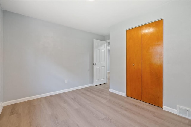1625 Loretta Dr, Penn Hills, PA 15235 - unfurnished bedroom featuring light wood-style floors and a closet