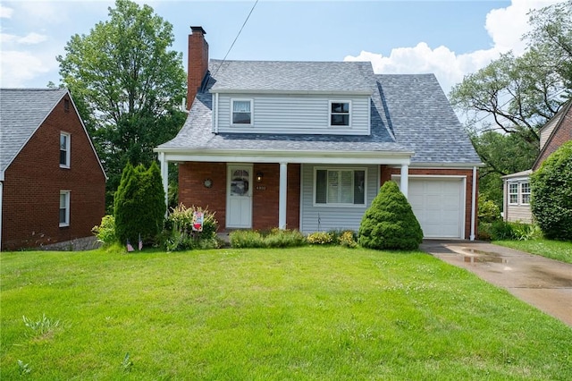 4800 W Brierly Dr, West Mifflin, PA 15122 - view of front of home with a chimney, concrete driveway, a front yard, a garage, and a porch