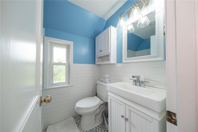4800 W Brierly Dr, West Mifflin, PA 15122 - bathroom featuring tile walls, vanity, and tile patterned floors