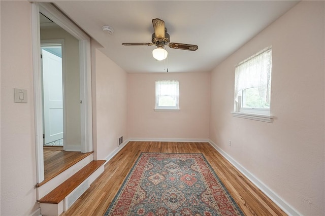 4800 W Brierly Dr, West Mifflin, PA 15122 - spare room with light wood finished floors, a smoke detector, and a ceiling fan
