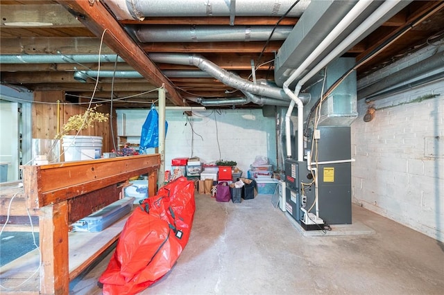 4800 W Brierly Dr, West Mifflin, PA 15122 - unfinished below grade area with heating unit and concrete block wall