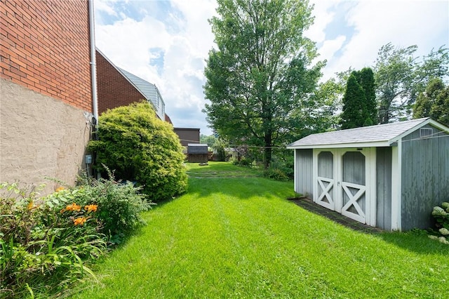 4800 W Brierly Dr, West Mifflin, PA 15122 - view of grassy yard with a storage unit