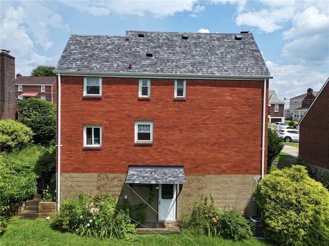 4800 W Brierly Dr, West Mifflin, PA 15122 - back of house with brick siding and a shingled roof