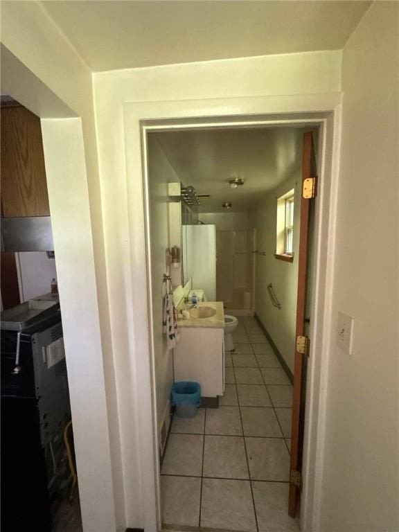 6036 Sawyer St, Lawrenceville, PA 15201 - corridor featuring light tile patterned floors and a sink