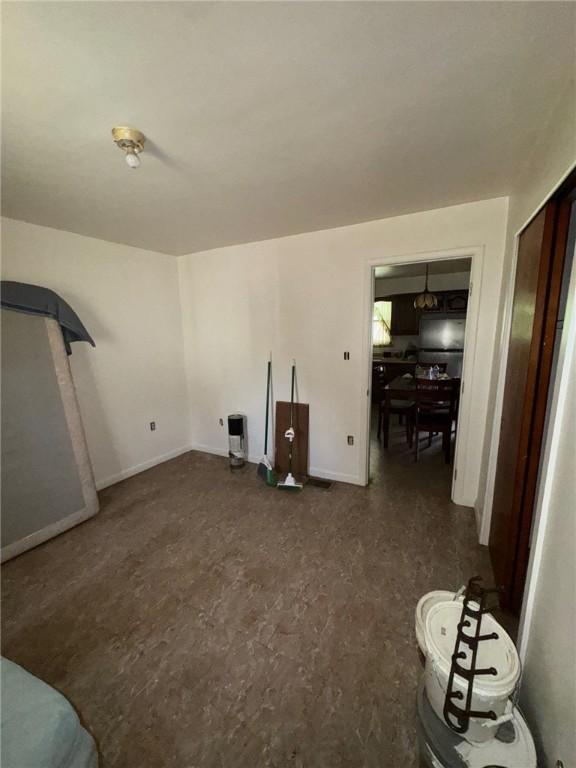 6036 Sawyer St, Lawrenceville, PA 15201 - unfurnished living room with baseboards