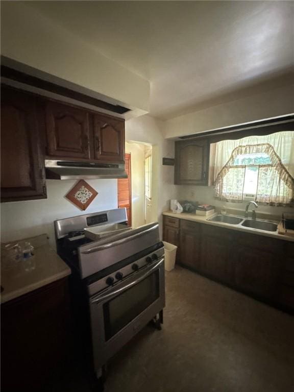 6036 Sawyer St, Lawrenceville, PA 15201 - kitchen with under cabinet range hood, stainless steel range oven, and light countertops