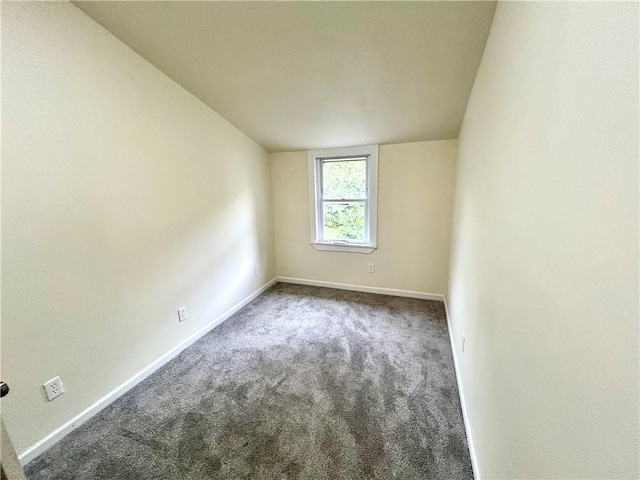 718 Breakneck Rd, Bullskin Twp, PA 15425 - unfurnished room featuring lofted ceiling and carpet floors
