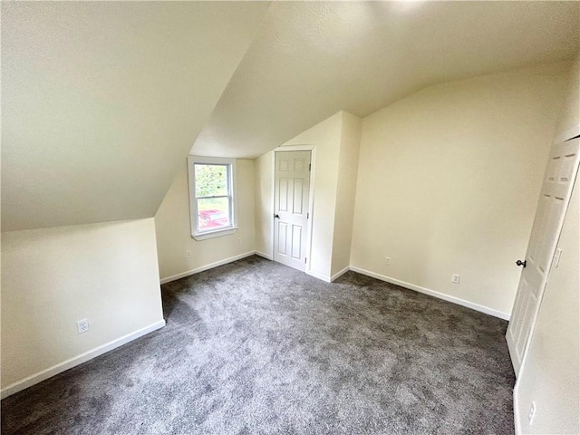 718 Breakneck Rd, Bullskin Twp, PA 15425 - additional living space featuring vaulted ceiling and dark carpet