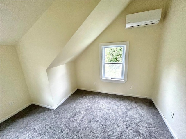 718 Breakneck Rd, Bullskin Twp, PA 15425 - bonus room featuring an AC wall unit, carpet flooring, and lofted ceiling