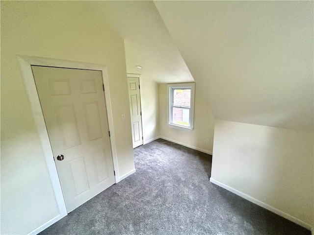 718 Breakneck Rd, Bullskin Twp, PA 15425 - additional living space featuring vaulted ceiling and dark carpet