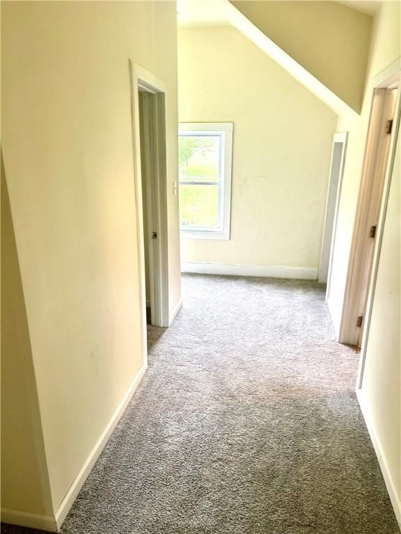 718 Breakneck Rd, Bullskin Twp, PA 15425 - hallway with carpet flooring and vaulted ceiling