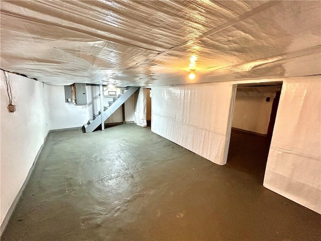 718 Breakneck Rd, Bullskin Twp, PA 15425 - unfinished basement with stairs, electric panel, and wooden ceiling