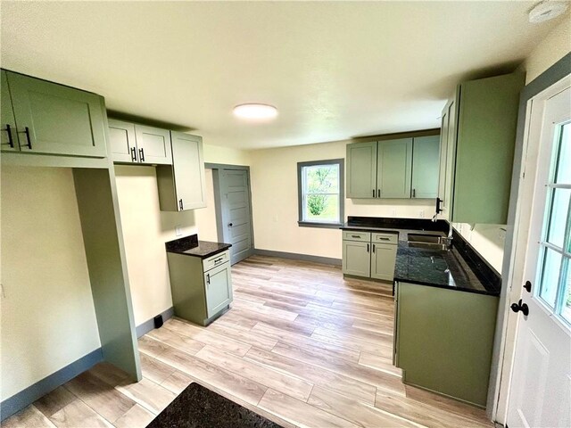 718 Breakneck Rd, Bullskin Twp, PA 15425 - kitchen featuring light wood-style floors and green cabinetry