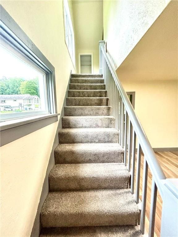 718 Breakneck Rd, Bullskin Twp, PA 15425 - staircase with a towering ceiling