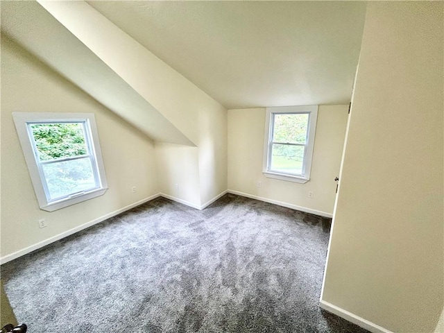 718 Breakneck Rd, Bullskin Twp, PA 15425 - bonus room featuring dark carpet and vaulted ceiling