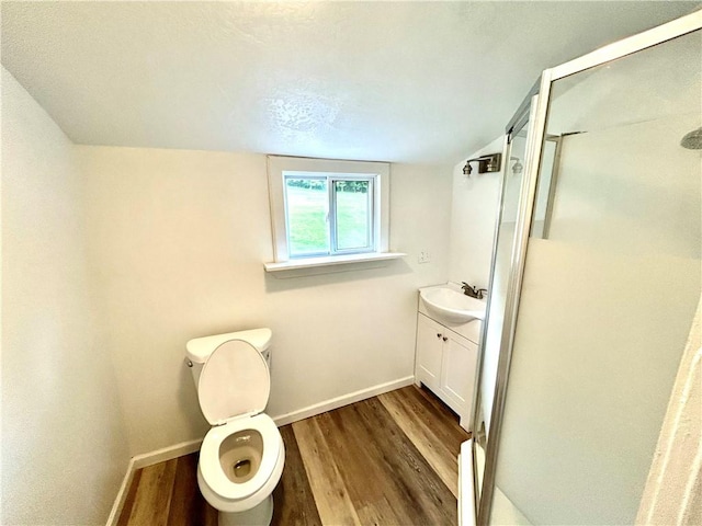 718 Breakneck Rd, Bullskin Twp, PA 15425 - full bathroom with wood finished floors, a stall shower, and vanity