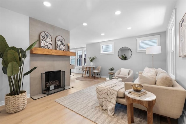 1610 Duffield St, Morningside, PA 15206 - living room featuring light wood finished floors, recessed lighting, and a large fireplace