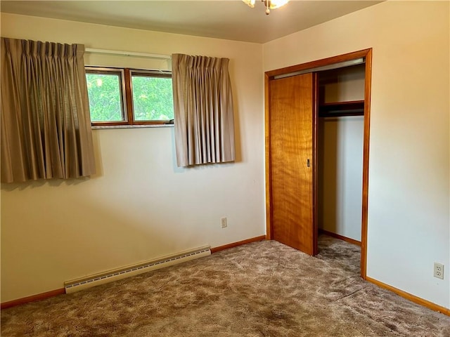 130 Overlook Dr, Brighton Twp, PA 15009 - unfurnished bedroom with baseboard heating, carpet, and a closet