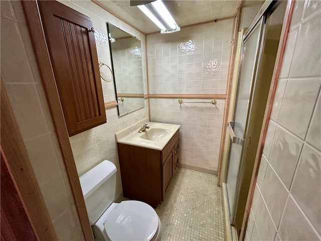 130 Overlook Dr, Brighton Twp, PA 15009 - bathroom featuring tile walls, a shower stall, vanity, and tile patterned floors