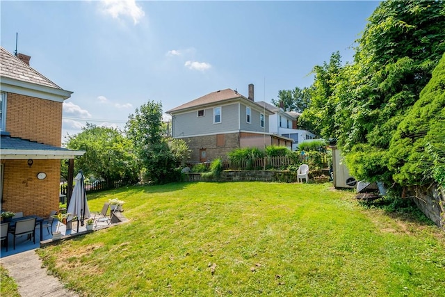 2102 Vodeli St, Beechview, PA 15216 - fenced backyard featuring a patio