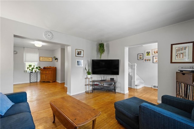 2102 Vodeli St, Beechview, PA 15216 - living room featuring wood finished floors and stairway
