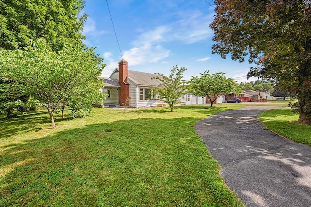 1837 Stoystown, Somerset Twp, PA 15541 - view of front of property with a front lawn and a chimney