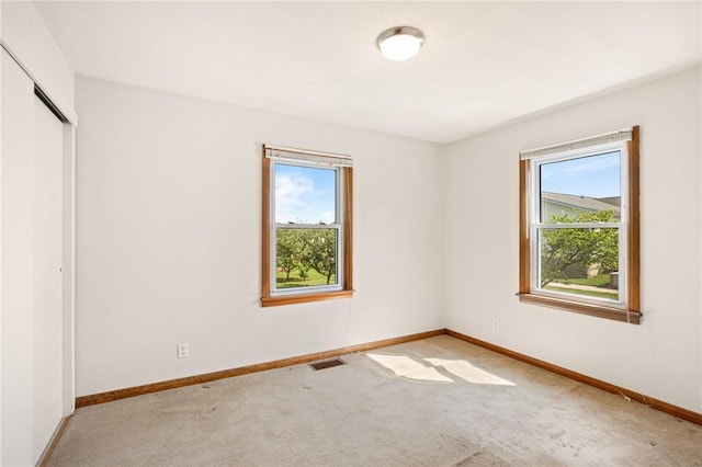 1837 Stoystown, Somerset Twp, PA 15541 - unfurnished bedroom with multiple windows, carpet floors, and a closet