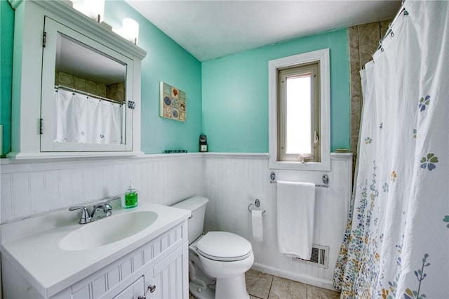 5215 Caste Dr, Whitehall, PA 15236 - full bath featuring vanity, a wainscoted wall, a shower with curtain, and tile patterned floors
