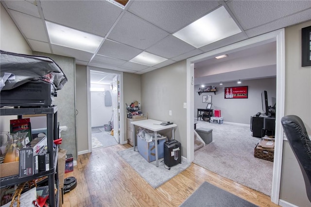 5215 Caste Dr, Whitehall, PA 15236 - finished basement featuring wood finished floors and a paneled ceiling